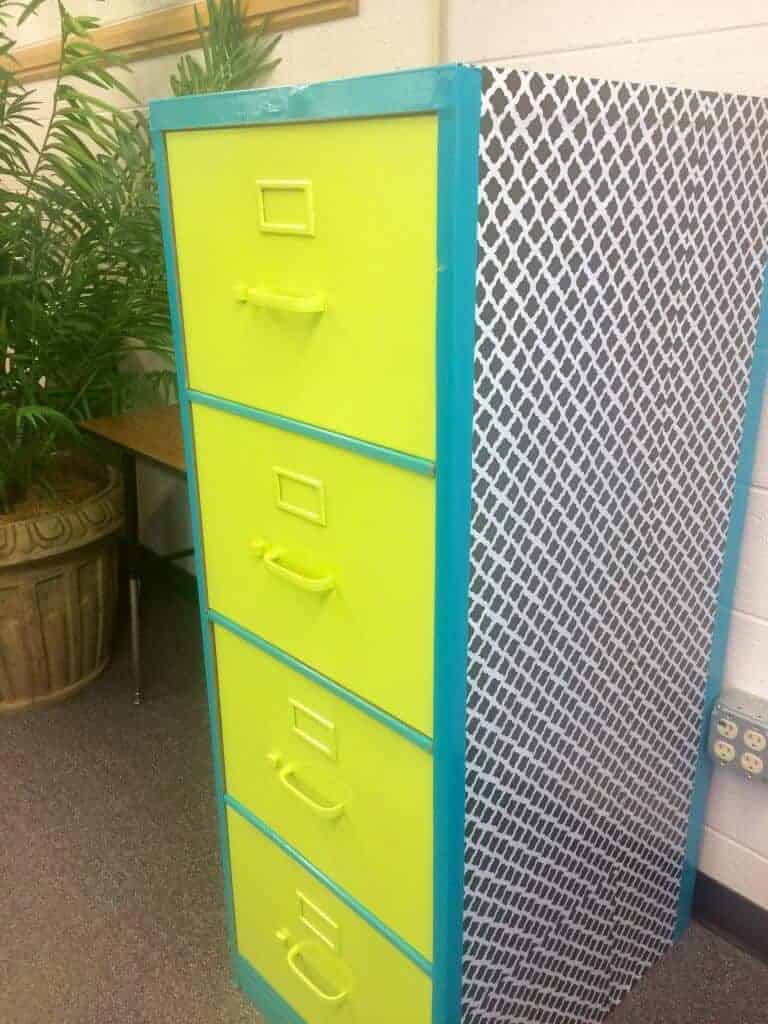 Finished filing cabinet makeover. Contact paper, duct tape, and some spray paint! Read about it on my blog :)