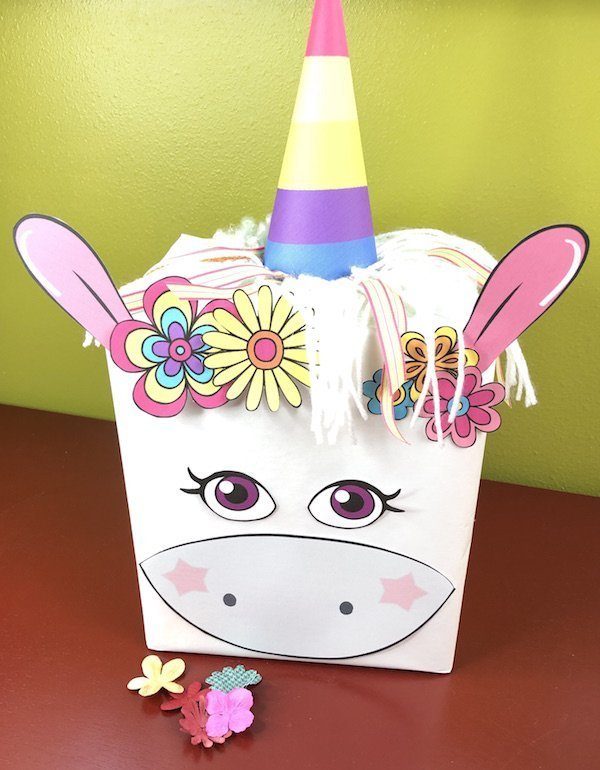 Create a whimsical and fun unicorn Valentines box for your child or students. Use the free printable to make a quick and easy unicorn craft project.