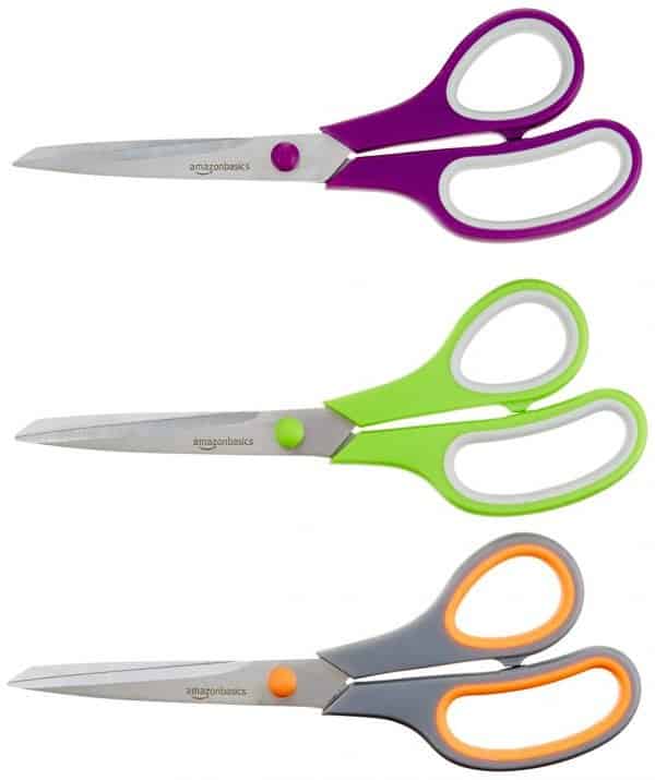 Teacher supplies scissors.